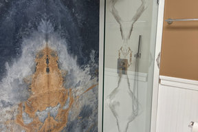 Master Bathroom Remodeling in Washington D.C. with a Bookmatched Slab Wall