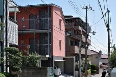 神戸にあるお手頃価格の中くらいなモダンスタイルのおしゃれな家の外観 (コンクリートサイディング、アパート・マンション) の写真