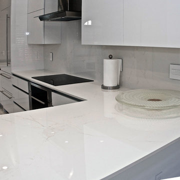High Gloss Acrylic Kitchen featuring Dekton Countertop