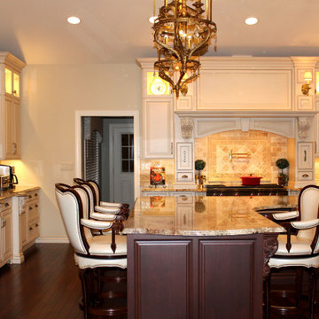 Luxurious Mediterranean Kitchen With A Custom Wood Hood And Cherry Island