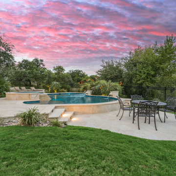 Freeform Pool with Spa and Scuppers in Texas Hill Country