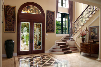Inspiration for a mediterranean entryway remodel in Orlando