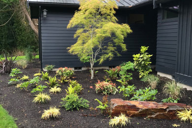 Photo of a rustic landscaping in Seattle.