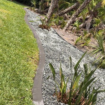 Elegant Landscape Renovation & Decorative Rock Installation