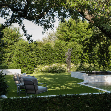 Contemporary Sculpture Garden With Formal Pool & Art-Driven Landscape Design