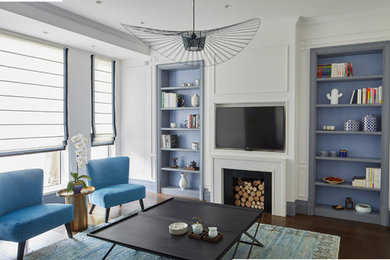Large trendy brown floor and dark wood floor living room photo in Other with white walls, a standard fireplace, a stone fireplace and a wall-mounted tv