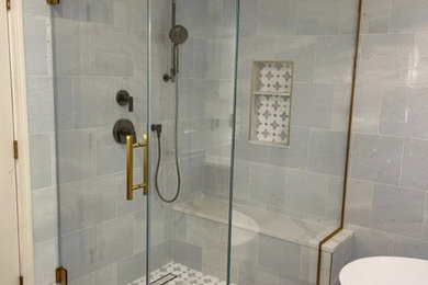 Inspiration for a contemporary master corner shower remodel in Boston with a hinged shower door