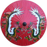Oriental-Decor - Mirrored Dragons, 35" Diameter Fashion Umbrella - This rich and powerful fashion umbrella depicts two Chinese dragons mirroring each other against an all-red background, which is symbolic of luck and prosperity in Asian culture. All of our decorative umbrellas are handcrafted by master artisans in Asia, where the tradition of umbrella making goes back over 200 years. Whether you are looking to enhance the look of your home or office, or protect yourself from the sun and rain, this decorative umbrella is the ideal choice.