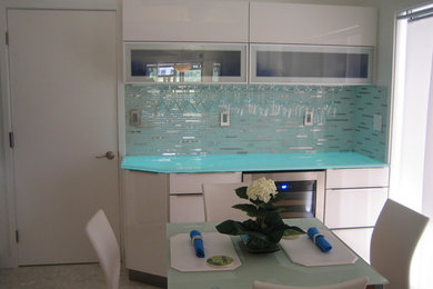 This is an example of a contemporary home design in Miami.