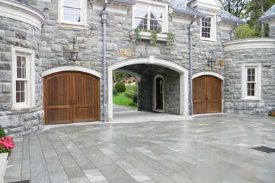 Porte cochere - large craftsman attached two-car porte cochere idea in New York