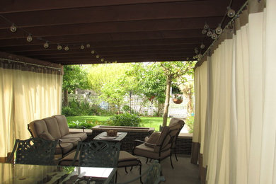 Patio - craftsman backyard concrete patio idea in Seattle
