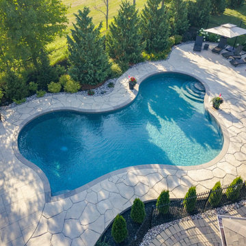 A Pool with a Countryside View