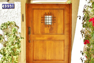 Example of a tuscan entryway design in Los Angeles