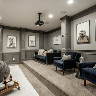 This is an example of a classic enclosed home cinema in Indianapolis with grey walls, carpet and grey floors.