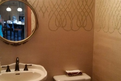Transitional powder room photo in Other