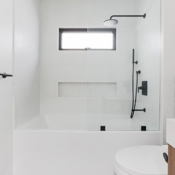 Tub Shower with Matte Black Plumbing Fixtures
