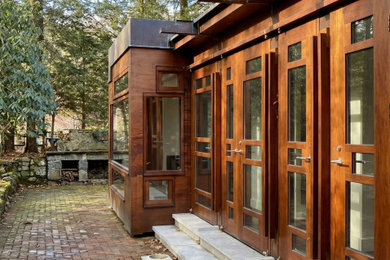 Inspiration for a mid-sized contemporary white two-story wood exterior home remodel with a shingle roof
