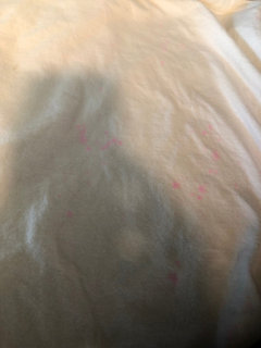 bright pink stains on washed clothes, help?