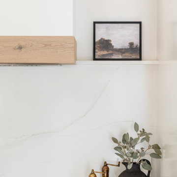 Modern Heritage Kitchen Detail with Integrated Stone Shelf and Custom Hood Trim