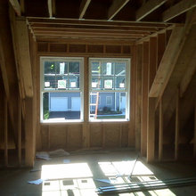 Cabin: Upstairs bedrooms with dormers