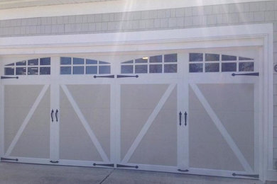 Photo of a country attached two-car garage in Other.