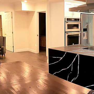 Structural Layout Reconfiguration Connecting Kitchen, Dining Area, and Fireplace