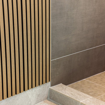 Elegant master bathroom with large format tile