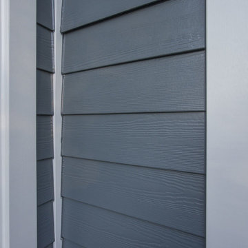 Exterior remodeling in Naperville with siding replacement and porch build out