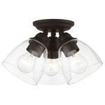 Livex Lighting - Montgomery 3 Light Bronze Semi-Flush - Whether it's style or practical lighting, this flush mount is the perfect addition to your bathroom, kitchen, hallway or bedroom. This three-light fixture from the Montgomery Collection features clear hand-blown glass shades and is shown in a bronze finish. The clean graceful lines of the canopy complement the shades, creating an understated look that works well in most decors. Classic elegance combines with contemporary appeal to enhance any home in style.