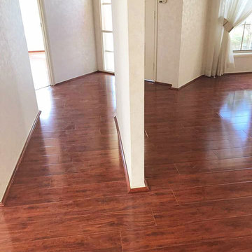 Tanoa Flooring - Red Mahogany YA771 12mm Gloss Laminate