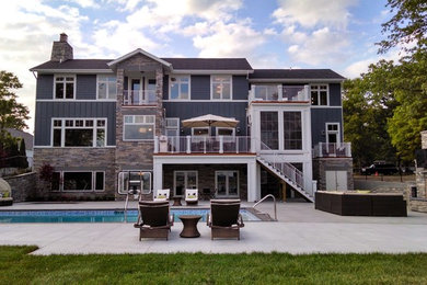 Example of a blue exterior home design in Grand Rapids
