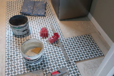 Creative Geometric designed kitchen floor installation.tile