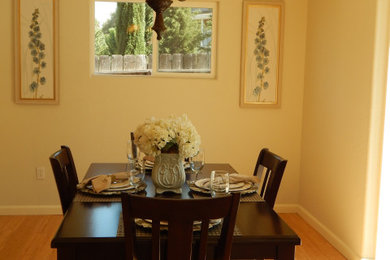 Great room - transitional light wood floor and beige floor great room idea in Other with yellow walls