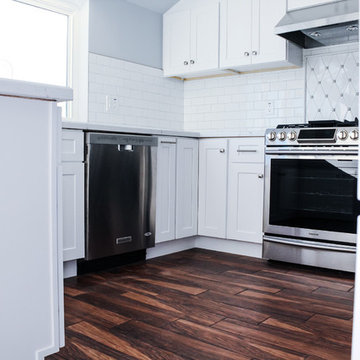 Shaker White Kitchen with porcelain wood tile floor