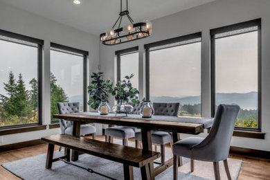 Example of a mountain style dining room design in Seattle