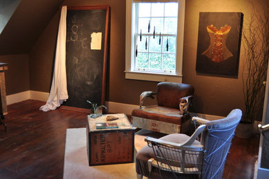Mid-sized minimalist loft-style medium tone wood floor living room photo in Oklahoma City