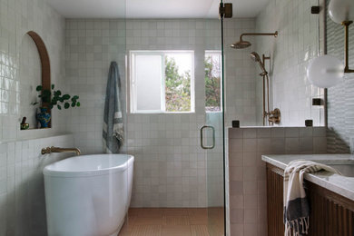 Example of a mid-sized mid-century modern white tile and ceramic tile ceramic tile, red floor, single-sink and wallpaper bathroom design in Sacramento with beaded inset cabinets, dark wood cabinets, a two-piece toilet, green walls, an undermount sink, marble countertops, a hinged shower door, white countertops, a niche and a freestanding vanity