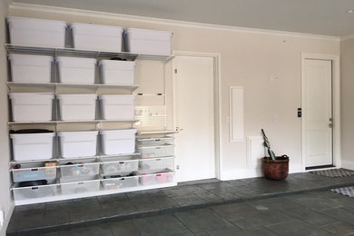 Large elegant attached two-car garage photo in Dallas
