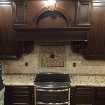 Omega Cabinets, Conklin door, Cherry wood, Chestnut stain.