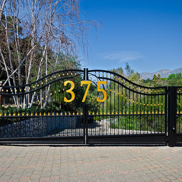 Decorative steel driveway gates