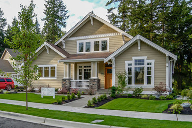 Example of a large arts and crafts exterior home design in Seattle