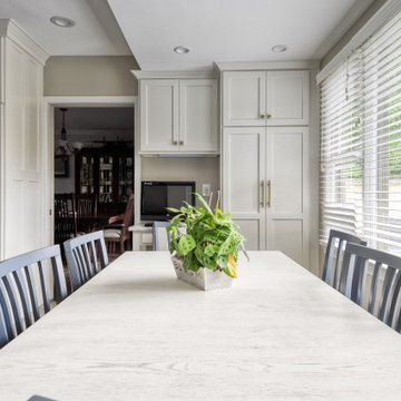 Navy Stained Island, Hood vent and Floating Shelves in White Shaker Kitchen