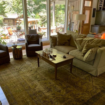 Persian Tabriz Oriental Rug creates an extension of outdoor living!