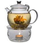 Teaposy - Daydream Glass Teapot With Light My Fire Warmer Set - Set includes one 24oz (or 700ml) Daydream teapot, with a stainless steel loose-leaf filter, built-in lid holder, and one Light My Fire tea warmer, 5 in (or 12.5cm) in diameter and with a small tea light, handmade with borosilicate glass, heat resistant.