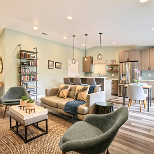 Inspiration for a large transitional formal and open concept bamboo floor and gray floor living room remodel in Other with green walls, no fireplace and a wall-mounted tv