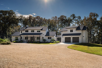 Large farmhouse white two-story wood exterior home photo in Miami with a shingle roof