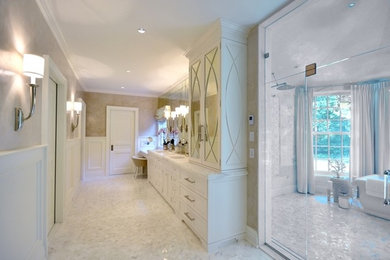 Bathroom - mid-sized transitional master white tile and mosaic tile mosaic tile floor and white floor bathroom idea in New York with shaker cabinets, white cabinets, beige walls, an undermount sink, marble countertops and a hinged shower door