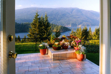 Beach style entryway photo in Vancouver