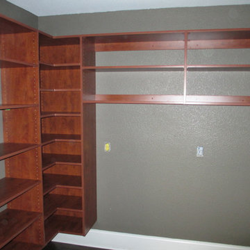 Walk-in Closet w/L-shaped corner shelves in summer flame color