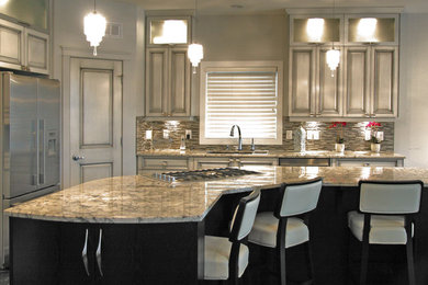 Inspiration for a large timeless l-shaped dark wood floor open concept kitchen remodel in Other with an undermount sink, raised-panel cabinets, white cabinets, granite countertops, multicolored backsplash, mosaic tile backsplash, stainless steel appliances and an island